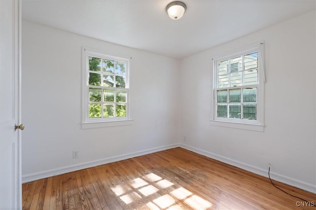 508 W Brighton Ave, Syracuse, NY 13205 - unfurnished room with hardwood / wood-style floors and baseboards