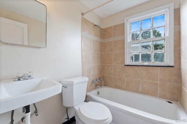 508 W Brighton Ave, Syracuse, NY 13205 - bathroom with toilet, tub / shower combination, and a sink