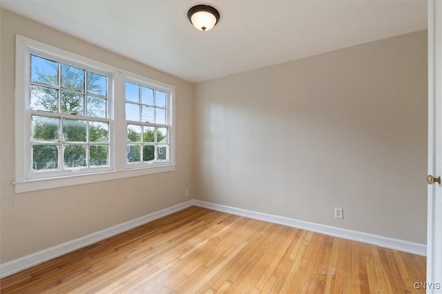 508 W Brighton Ave, Syracuse, NY 13205 - unfurnished room with baseboards and light wood finished floors