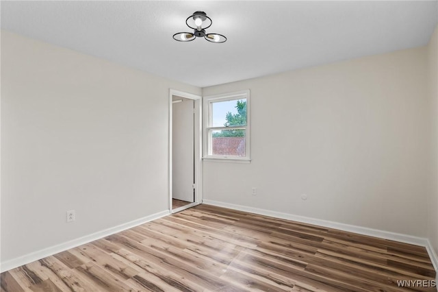 307 Wadsworth Ct, Tonawanda-City, NY 14150 - spare room with light wood-style floors and baseboards
