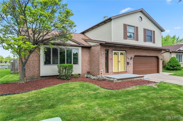 307 Wadsworth Ct, Tonawanda-City, NY 14150 - view of front of house featuring an attached garage, brick siding, and driveway