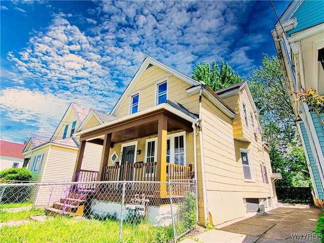 587 Goodyear Ave, Buffalo, NY 14211 - view of front facade with a porch