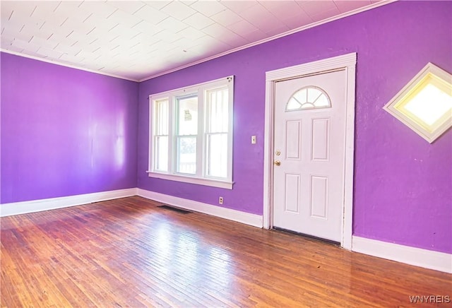 587 Goodyear Ave, Buffalo, NY 14211 - entrance foyer featuring ornamental molding, hardwood / wood-style floors, and baseboards