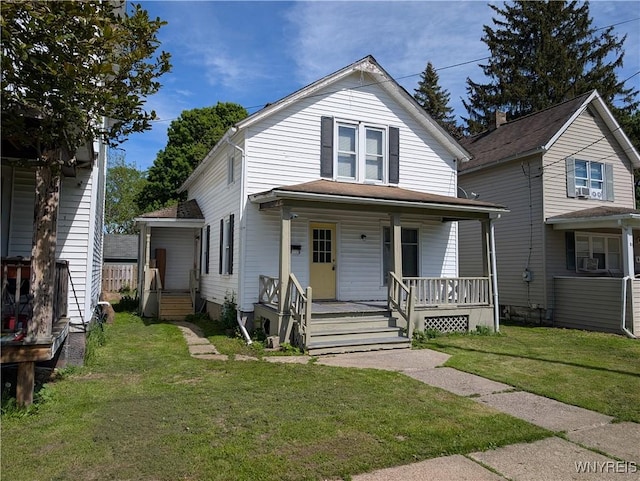 334 N 13th St, Olean-City, NY 14760 - view of front of home with a porch and a front lawn