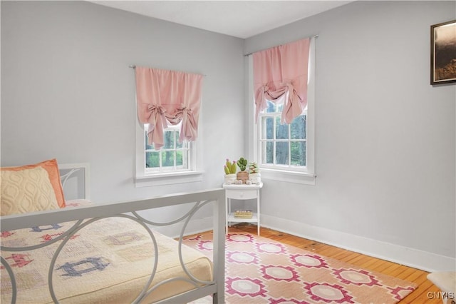 2875 W Lake Rd, Cazenovia, NY 13035 - sitting room with wood finished floors and baseboards
