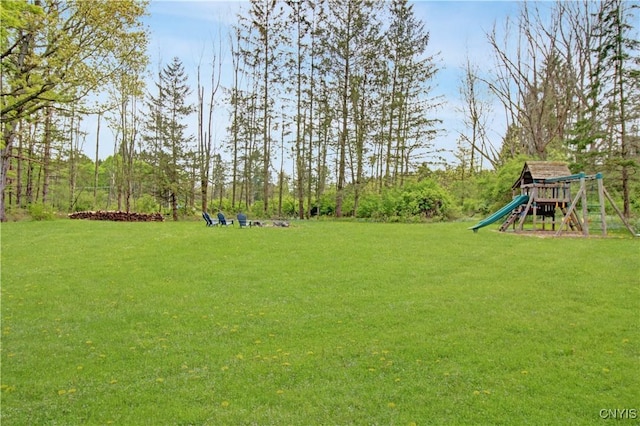 2875 W Lake Rd, Cazenovia, NY 13035 - view of grassy yard with a playground