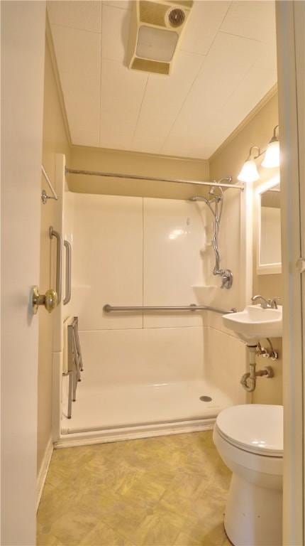 15 Wycliffe Rd, Waterloo, NY 13165 - bathroom with toilet, a stall shower, and a sink