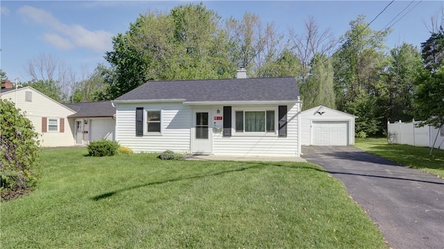 15 Wycliffe Rd, Waterloo, NY 13165 - single story home with an outbuilding, driveway, a front yard, and a chimney