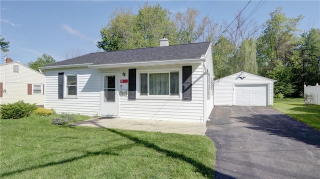 15 Wycliffe Rd, Waterloo, NY 13165 - view of front facade with driveway, an outbuilding, a front lawn, and a garage
