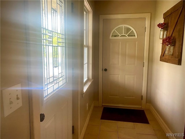 80 Sunnydale Ave, Wellsville, NY 14895 - doorway with tile patterned flooring and baseboards