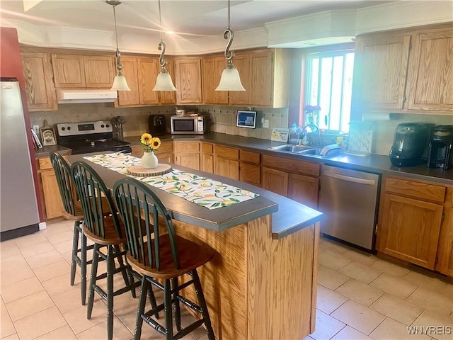 80 Sunnydale Ave, Wellsville, NY 14895 - kitchen featuring appliances with stainless steel finishes, custom range hood, dark countertops, a kitchen island, and backsplash