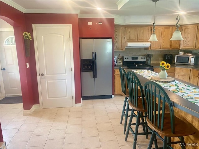 80 Sunnydale Ave, Wellsville, NY 14895 - kitchen featuring appliances with stainless steel finishes, ventilation hood, arched walkways, dark countertops, and decorative backsplash