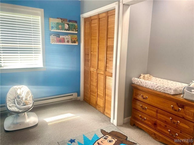 80 Sunnydale Ave, Wellsville, NY 14895 - bedroom with a closet, light colored carpet, and a baseboard heating unit