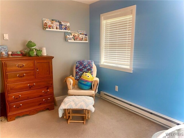 80 Sunnydale Ave, Wellsville, NY 14895 - living area with a baseboard heating unit and carpet floors