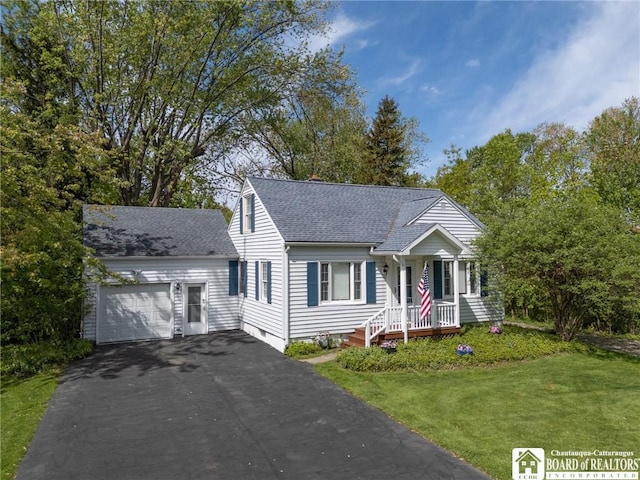 10595 Linwood Dr, Dunkirk-Town, NY 14048 - view of front of house with roof with shingles, asphalt driveway, a front lawn, and a garage