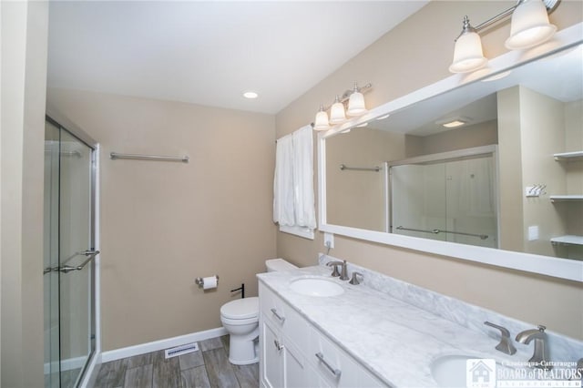 10595 Linwood Dr, Dunkirk-Town, NY 14048 - bathroom featuring a stall shower, toilet, wood finished floors, and baseboards