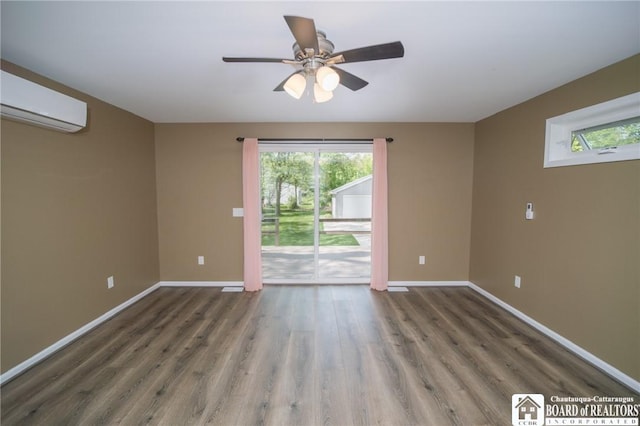 10595 Linwood Dr, Dunkirk-Town, NY 14048 - unfurnished room with a wall mounted air conditioner, ceiling fan, plenty of natural light, and wood finished floors