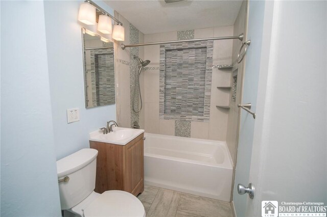 10595 Linwood Dr, Dunkirk-Town, NY 14048 - bathroom featuring shower / bathtub combination, toilet, and vanity