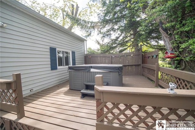 10595 Linwood Dr, Dunkirk-Town, NY 14048 - wooden terrace with a hot tub