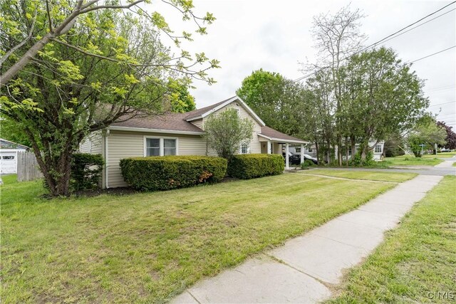 152 Leray St, Le Ray, NY 13612 - view of property exterior featuring a lawn