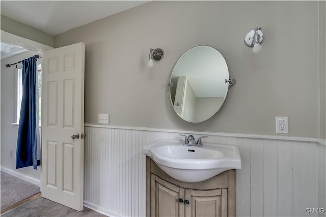 152 Leray St, Le Ray, NY 13612 - bathroom with wainscoting and vanity