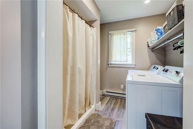 37 York St, Mendon, NY 14472 - washroom with a baseboard radiator, washing machine and clothes dryer, and light wood-style flooring