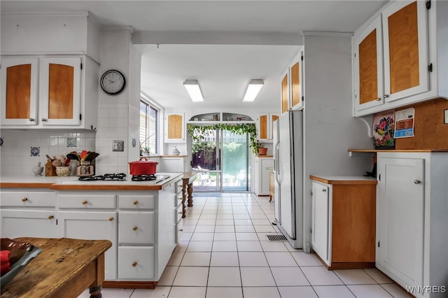 41 Irving Pl, Buffalo, NY 14201 - kitchen featuring white appliances, light countertops, tasteful backsplash, white cabinetry, and light tile patterned flooring