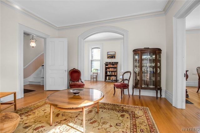 41 Irving Pl, Buffalo, NY 14201 - living area with crown molding, stairs, and wood-type flooring