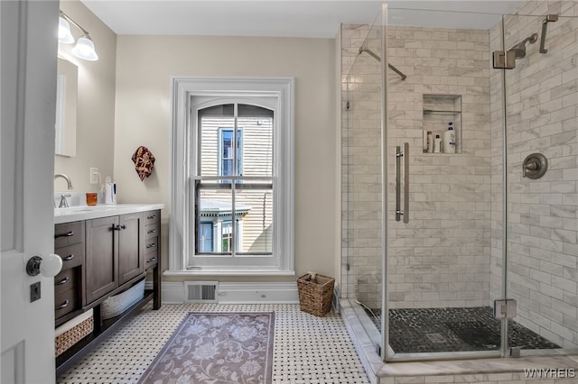 41 Irving Pl, Buffalo, NY 14201 - full bath featuring tile patterned floors, a shower stall, and vanity