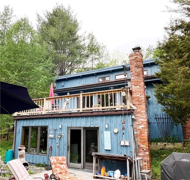 620 Ullas Way, Davenport, NY 13750 - rear view of property featuring a chimney and board and batten siding