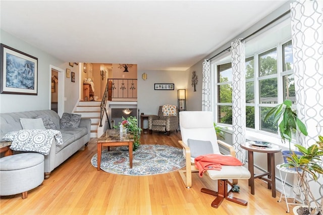 310 Wedgewood Ter, Dewitt, NY 13214 - living area featuring wood finished floors and stairway