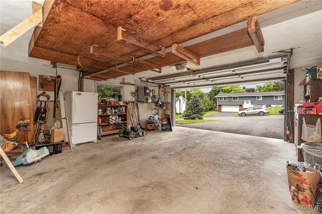 310 Wedgewood Ter, Dewitt, NY 13214 - garage with freestanding refrigerator