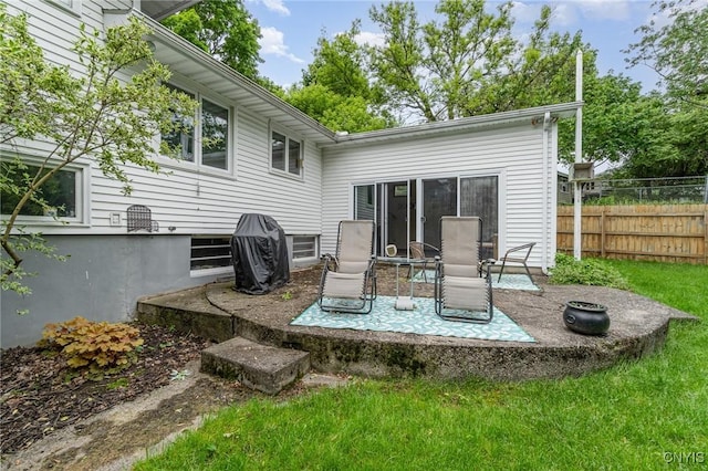 310 Wedgewood Ter, Dewitt, NY 13214 - back of property featuring a patio area