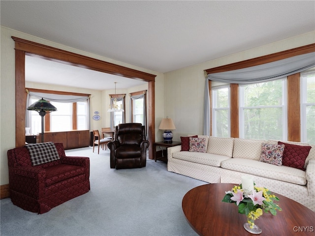 916 State St, Wilna, NY 13619 - carpeted living area featuring plenty of natural light