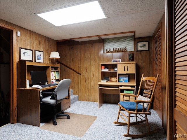 916 State St, Wilna, NY 13619 - carpeted home office featuring wood walls and a paneled ceiling