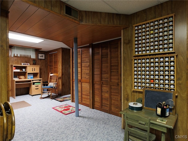 916 State St, Wilna, NY 13619 - home office with carpet floors and wood walls