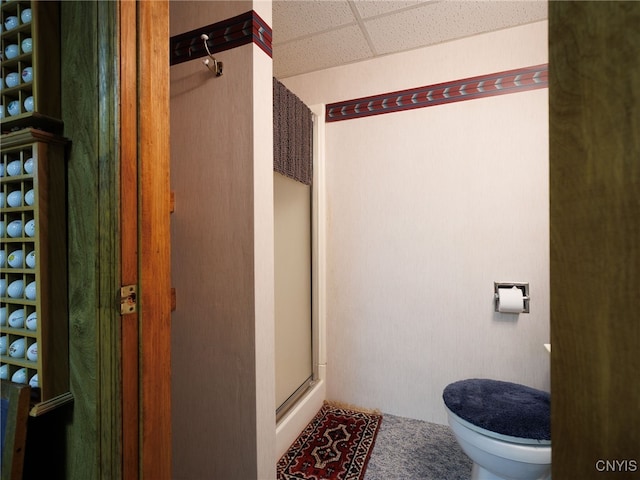 916 State St, Wilna, NY 13619 - full bath featuring a paneled ceiling, a shower stall, and toilet