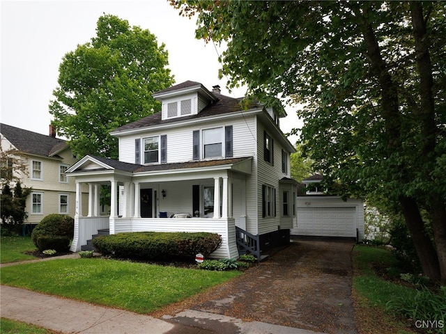 916 State St, Wilna, NY 13619 - traditional style home featuring an outdoor structure, a porch, a detached garage, a front yard, and a chimney