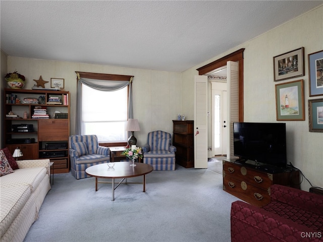 916 State St, Wilna, NY 13619 - carpeted living area with a textured ceiling