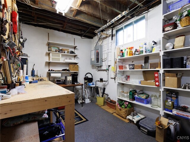 916 State St, Wilna, NY 13619 - basement with electric panel and a workshop area