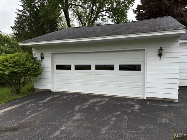 74 Eaton St, Hamilton, NY 13346 - garage featuring driveway