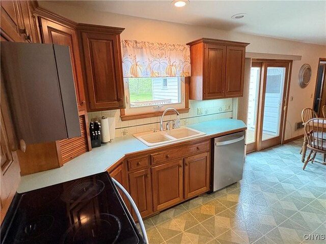 74 Eaton St, Hamilton, NY 13346 - kitchen with dishwasher, a sink, black range with electric stovetop, light floors, and light countertops