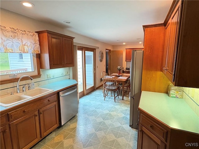 74 Eaton St, Hamilton, NY 13346 - kitchen featuring appliances with stainless steel finishes, a sink, light floors, plenty of natural light, and recessed lighting