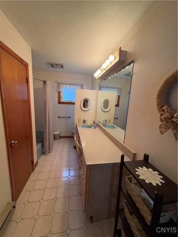 74 Eaton St, Hamilton, NY 13346 - bathroom with vanity, shower / bath combination with curtain, and toilet