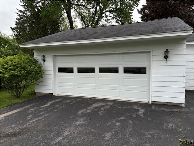 74 Eaton St, Hamilton, NY 13346 - garage featuring driveway
