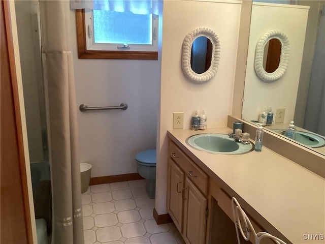 74 Eaton St, Hamilton, NY 13346 - bathroom featuring toilet, curtained shower, tile patterned floors, and vanity