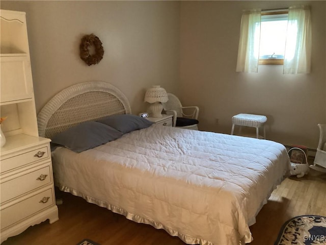 74 Eaton St, Hamilton, NY 13346 - bedroom with dark wood finished floors