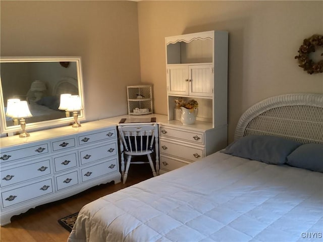 74 Eaton St, Hamilton, NY 13346 - bedroom featuring dark wood finished floors
