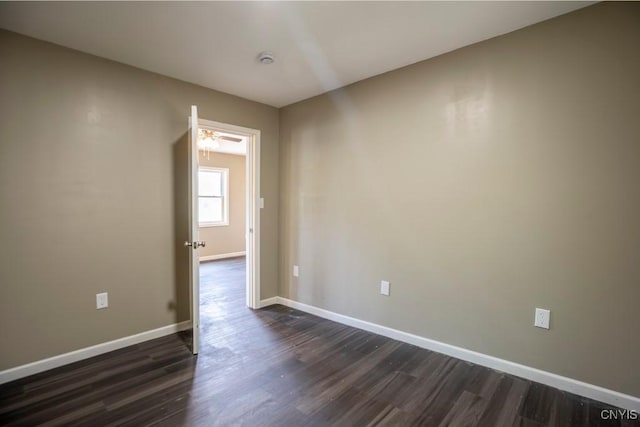 2707 State Route 48, Minetto, NY 13115 - empty room featuring dark wood finished floors and baseboards