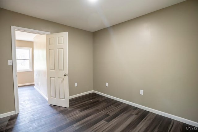2707 State Route 48, Minetto, NY 13115 - empty room with baseboards and dark wood-type flooring